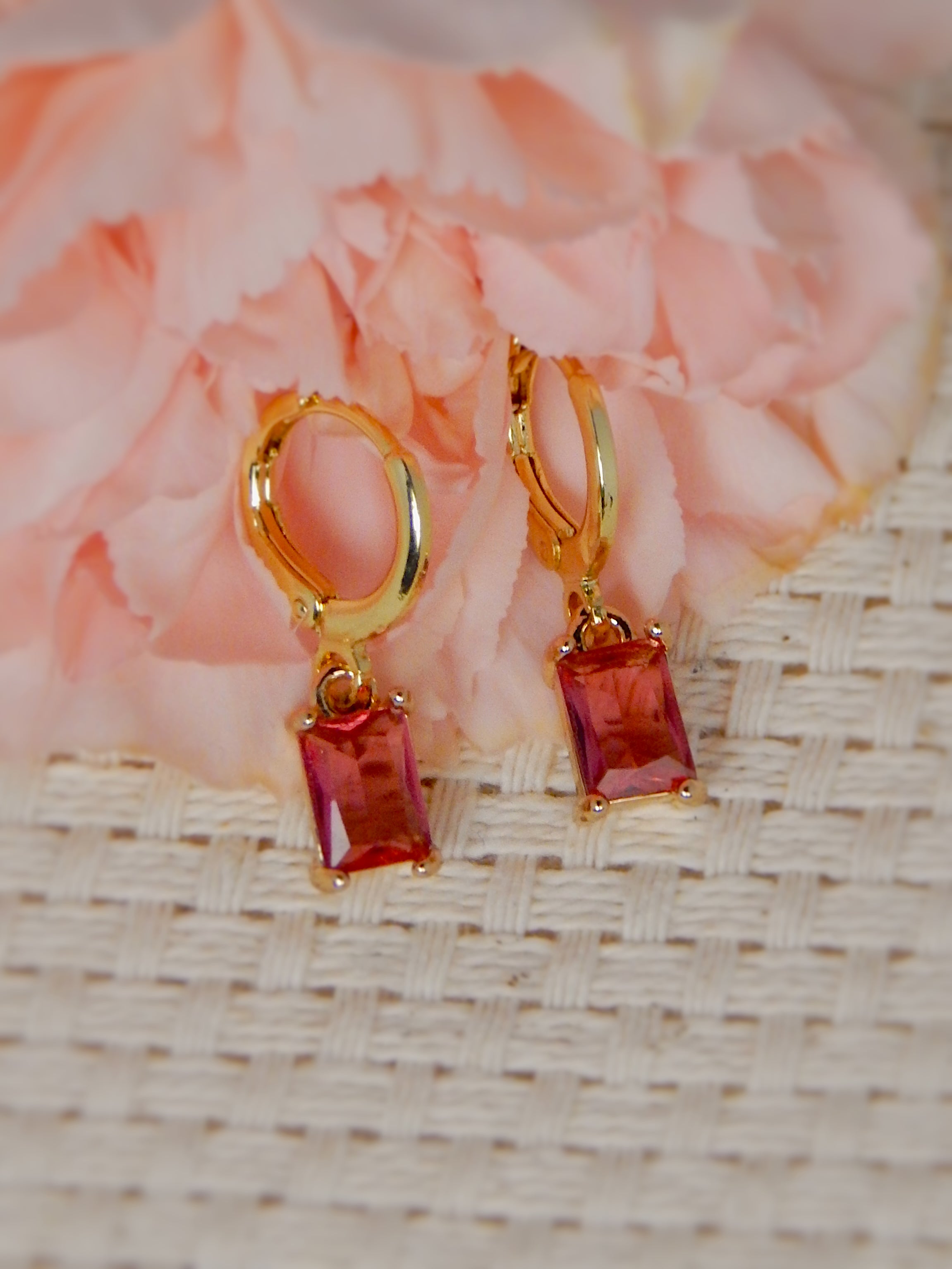Gold huggie earrings with pink rectangular gemstone drop earrings