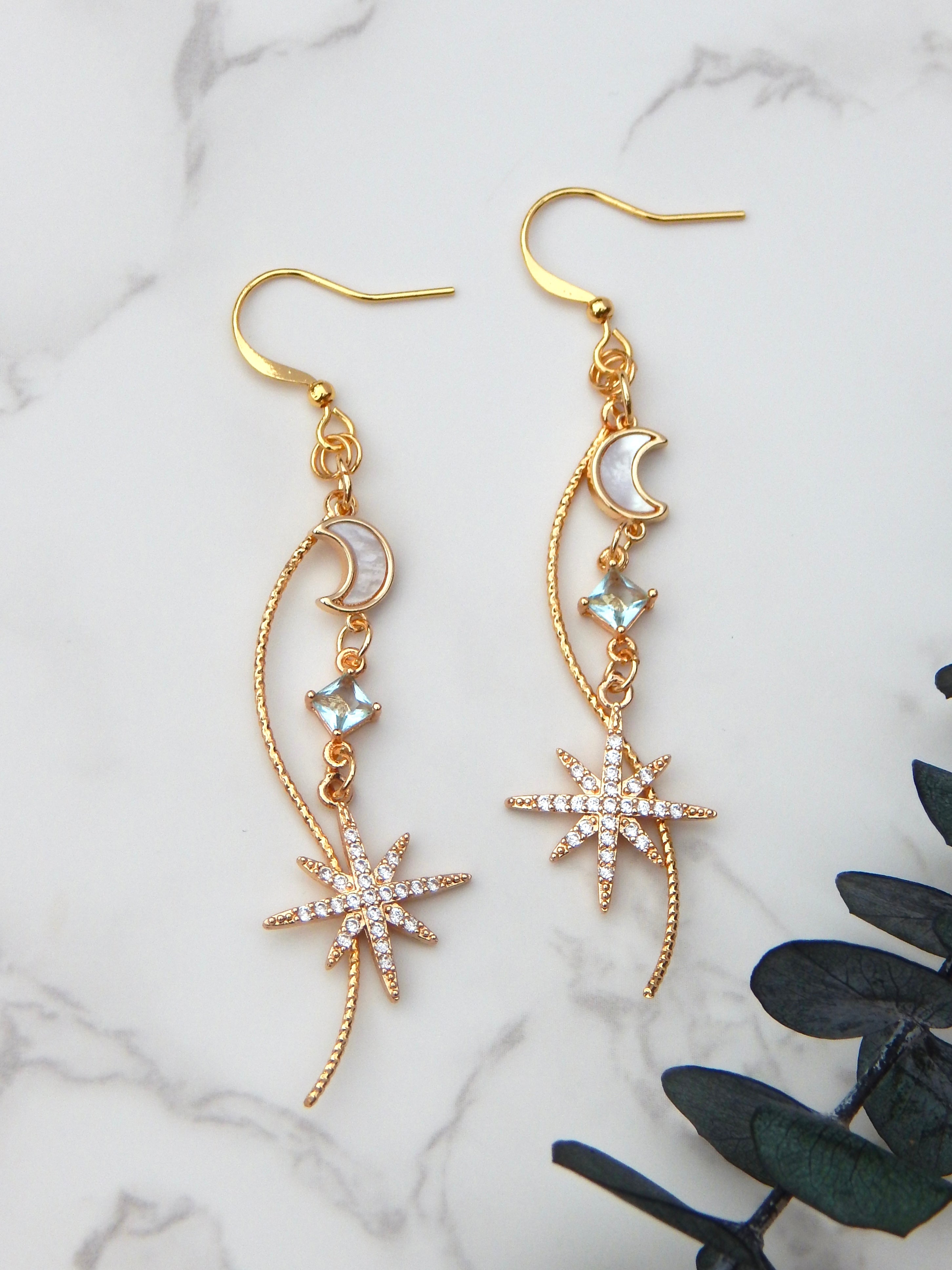 Celestial Cascade Earrings – Gold Star & Moon Dangles with CZ, Mother of Pearl & Twisted Bar Accent