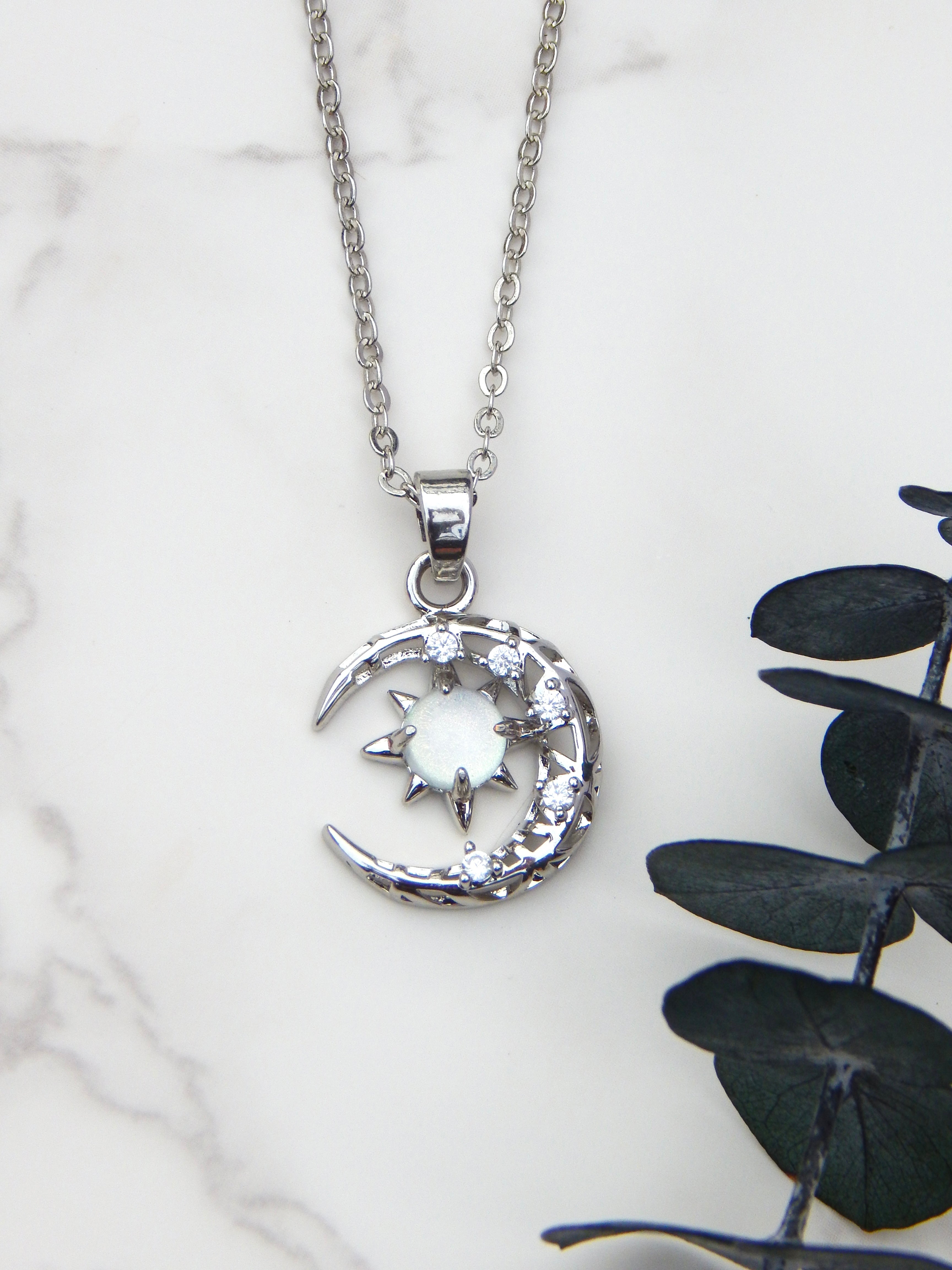 Cosmos Glow Necklace – Sun, Moon & Crystal Pendant in Silver or Gold