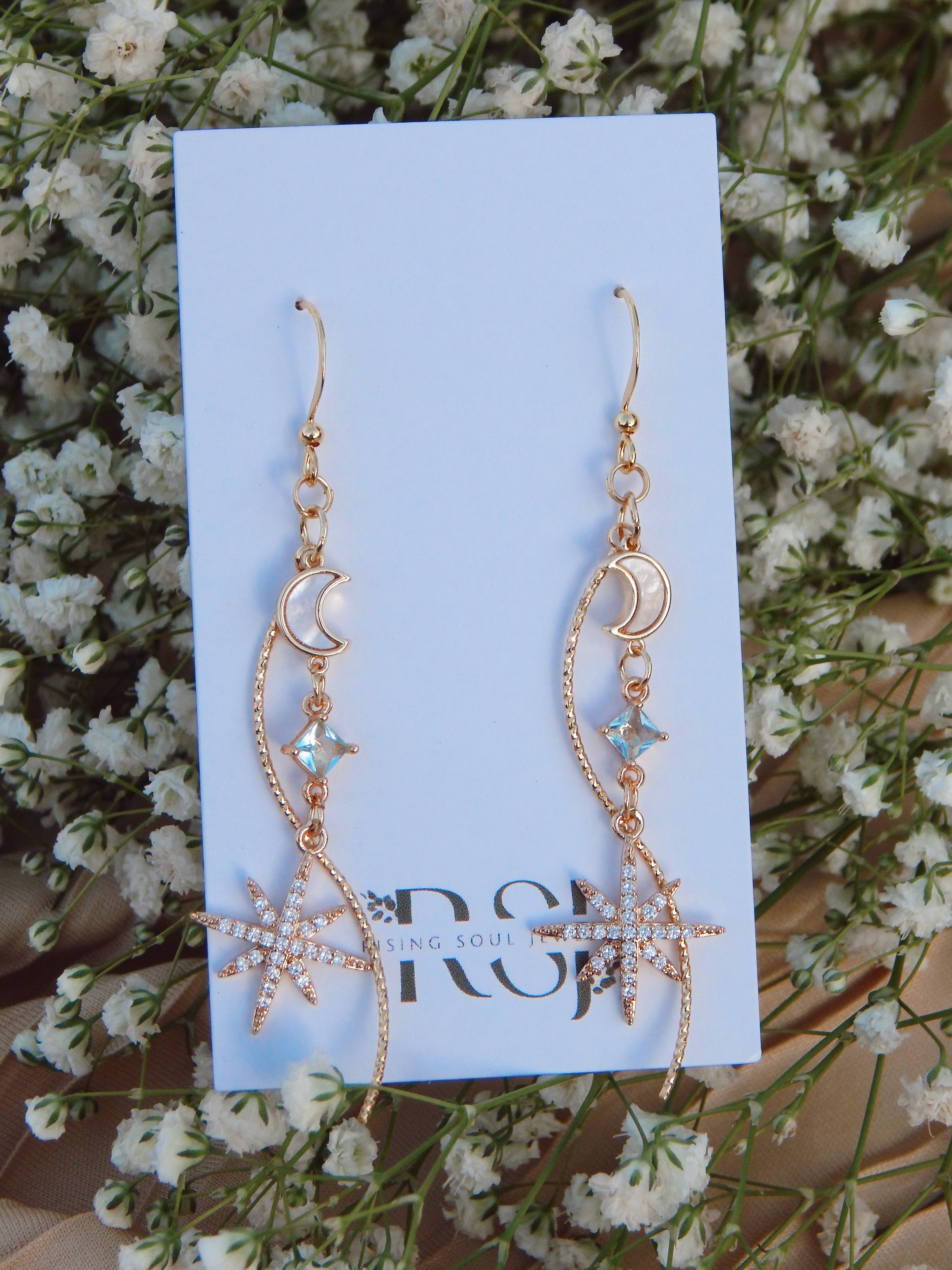 Celestial Cascade Earrings – Gold Star & Moon Dangles with CZ, Mother of Pearl & Twisted Bar Accent