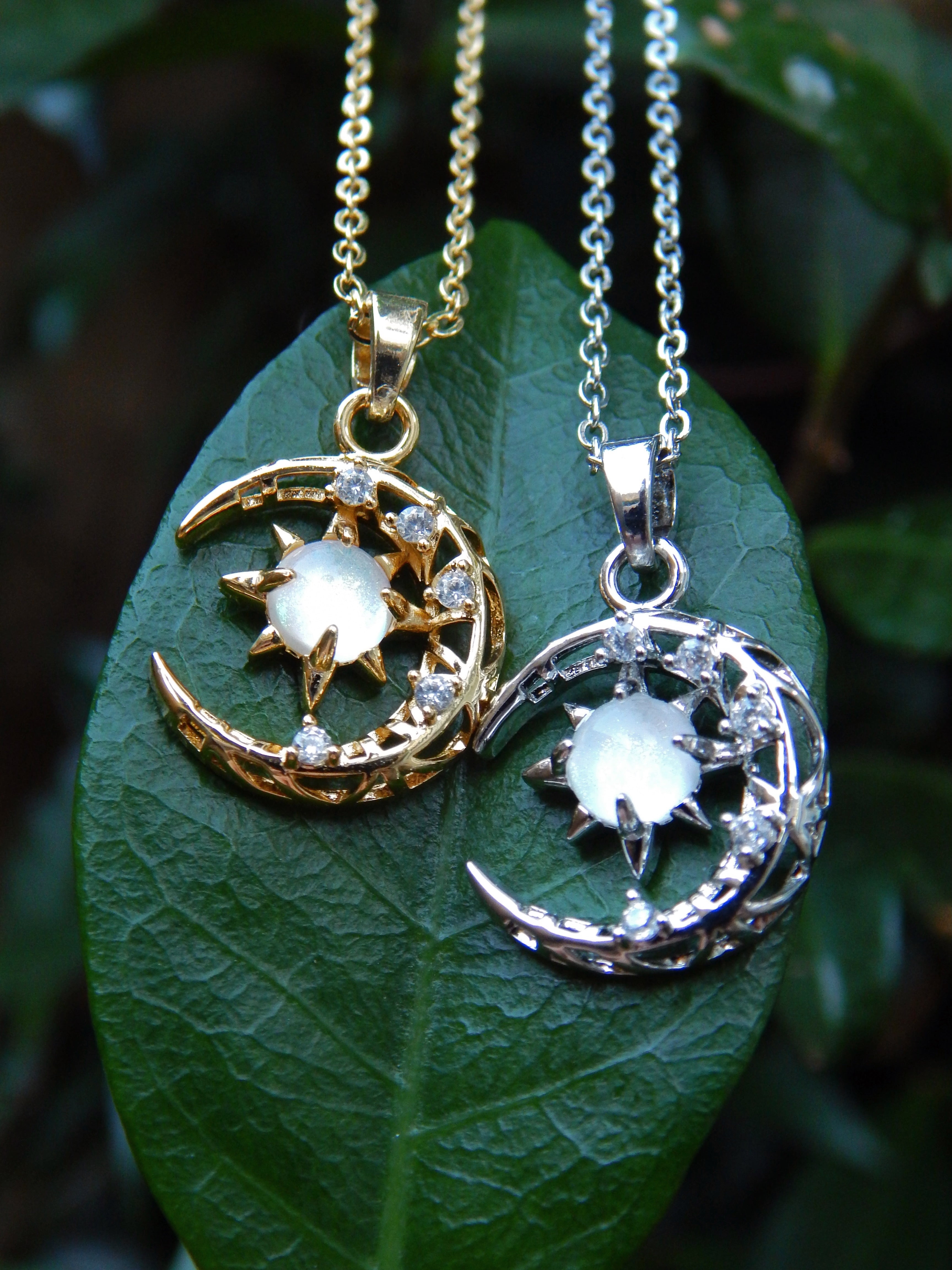 Cosmos Glow Necklace – Sun, Moon & Crystal Pendant in Silver or Gold