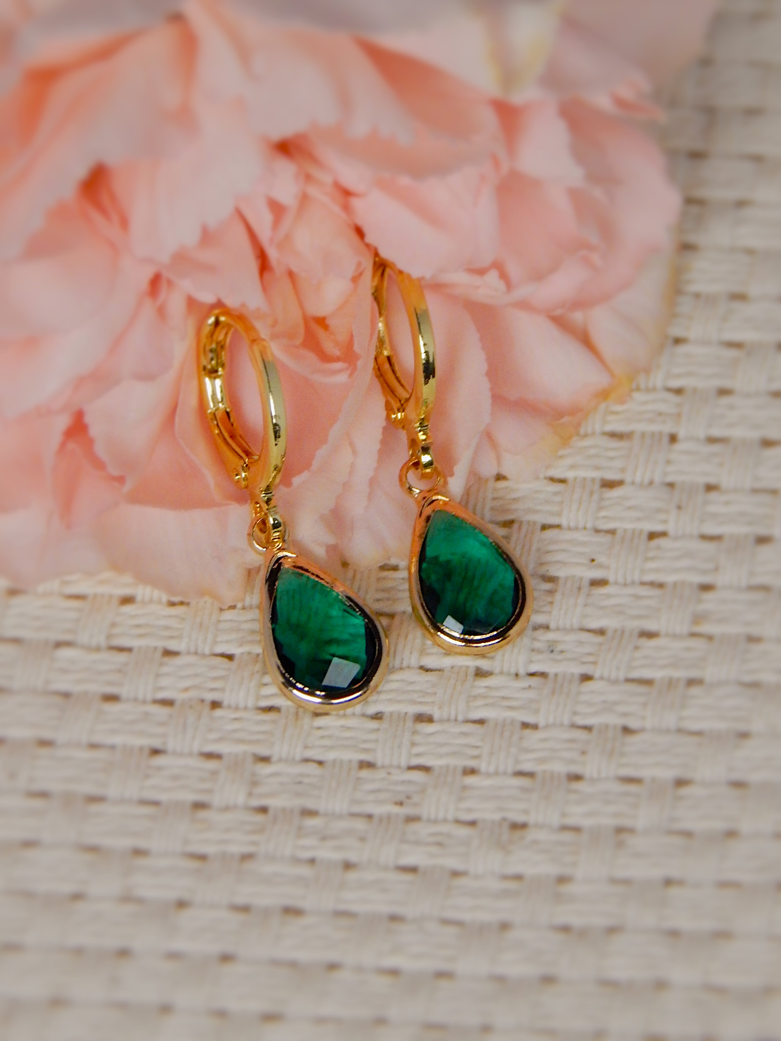 Gold huggie earrings with dark green teardrop gemstone drop, elegant statement jewelry