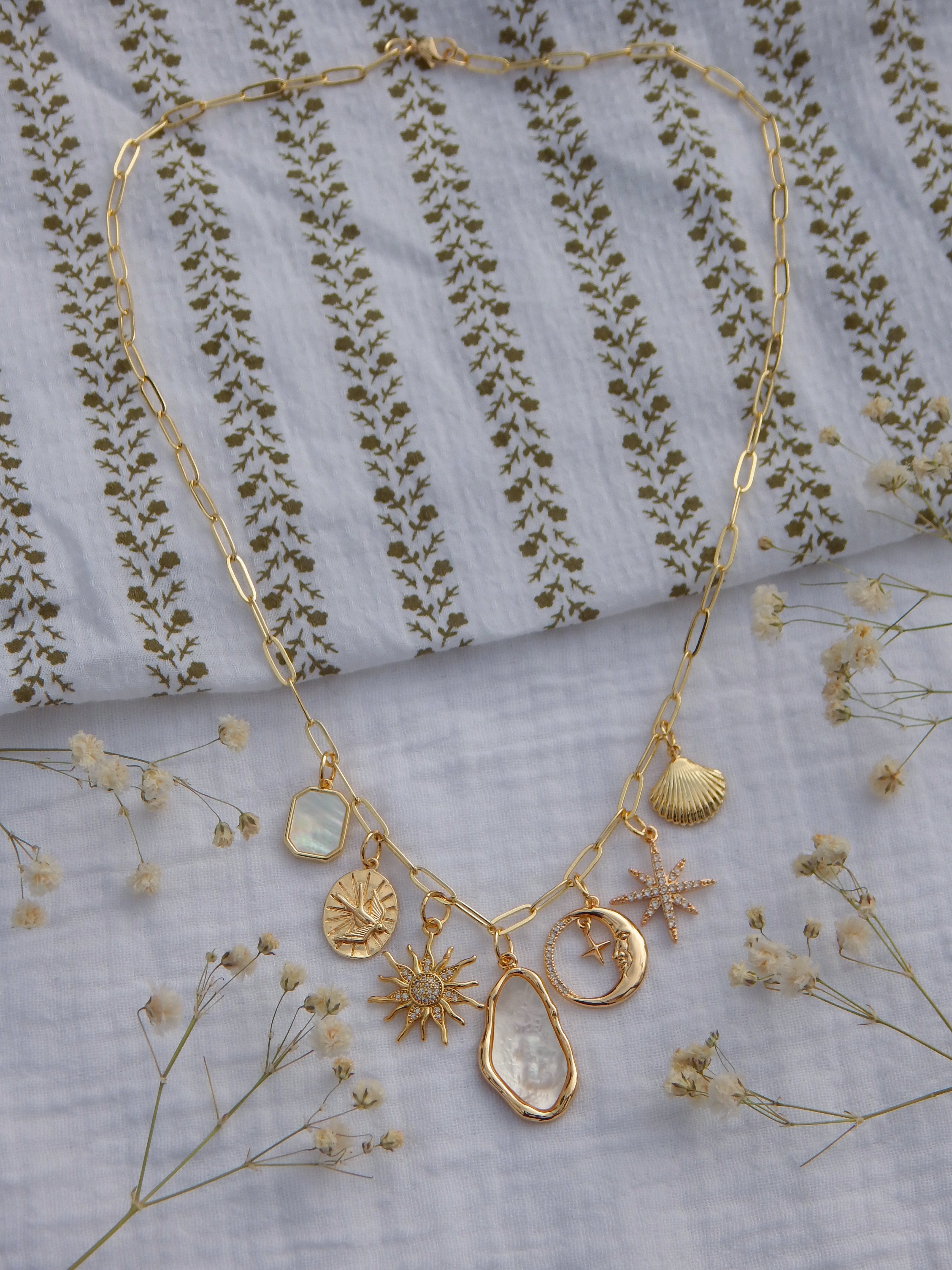 One-of-a-Kind Coastal Celestial Charm Necklace | Mother of Pearl Pendant | CZ Sun & Starburst | Moon & Star Charm | Gold Bird & Seashell | 18” Paperclip Chain