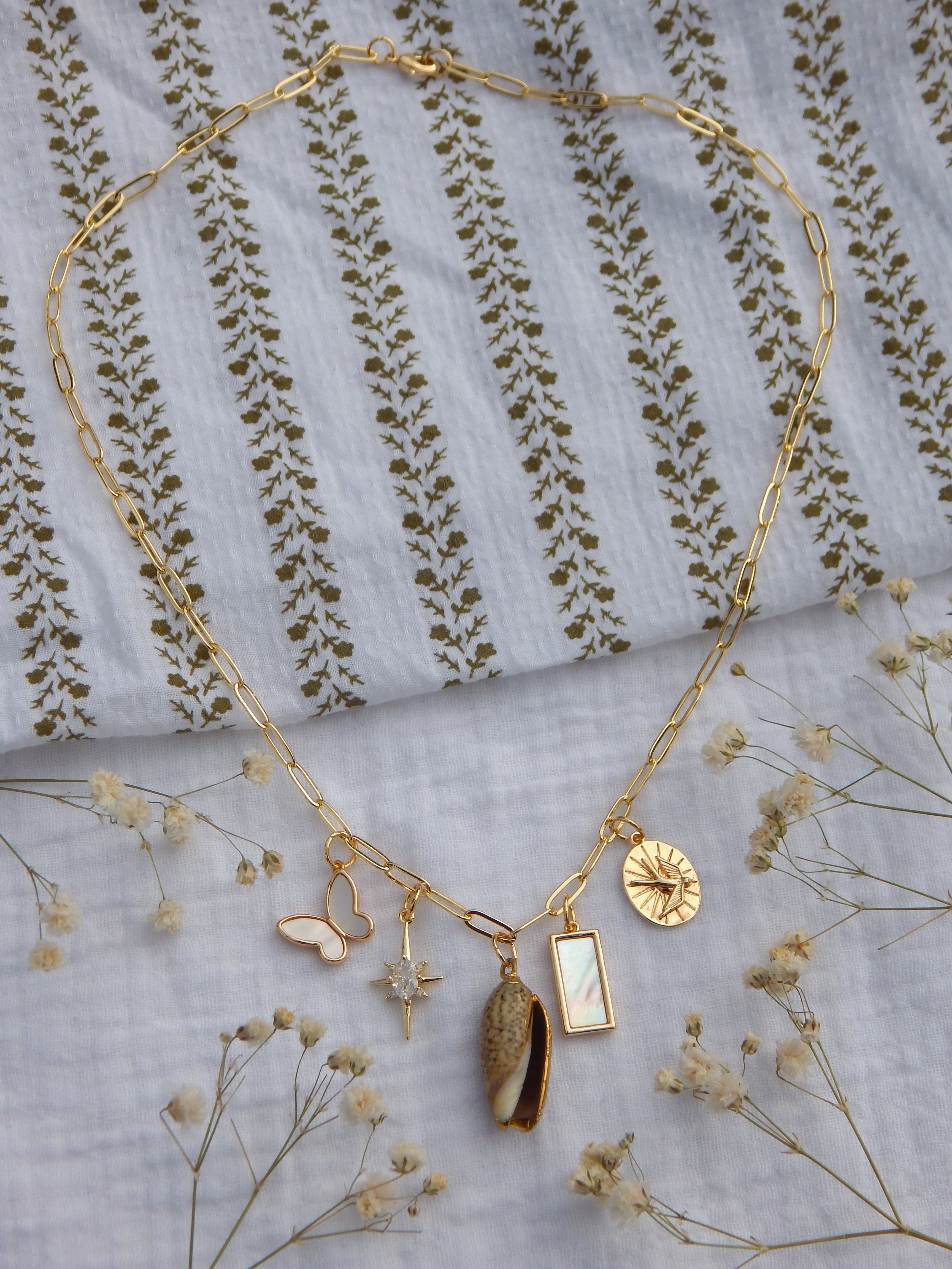 One-of-a-Kind Coastal Charm Necklace | Mother of Pearl Butterfly | CZ North Star | Natural Seashell Pendant | Bird Charm | 18” Gold Paperclip Chain