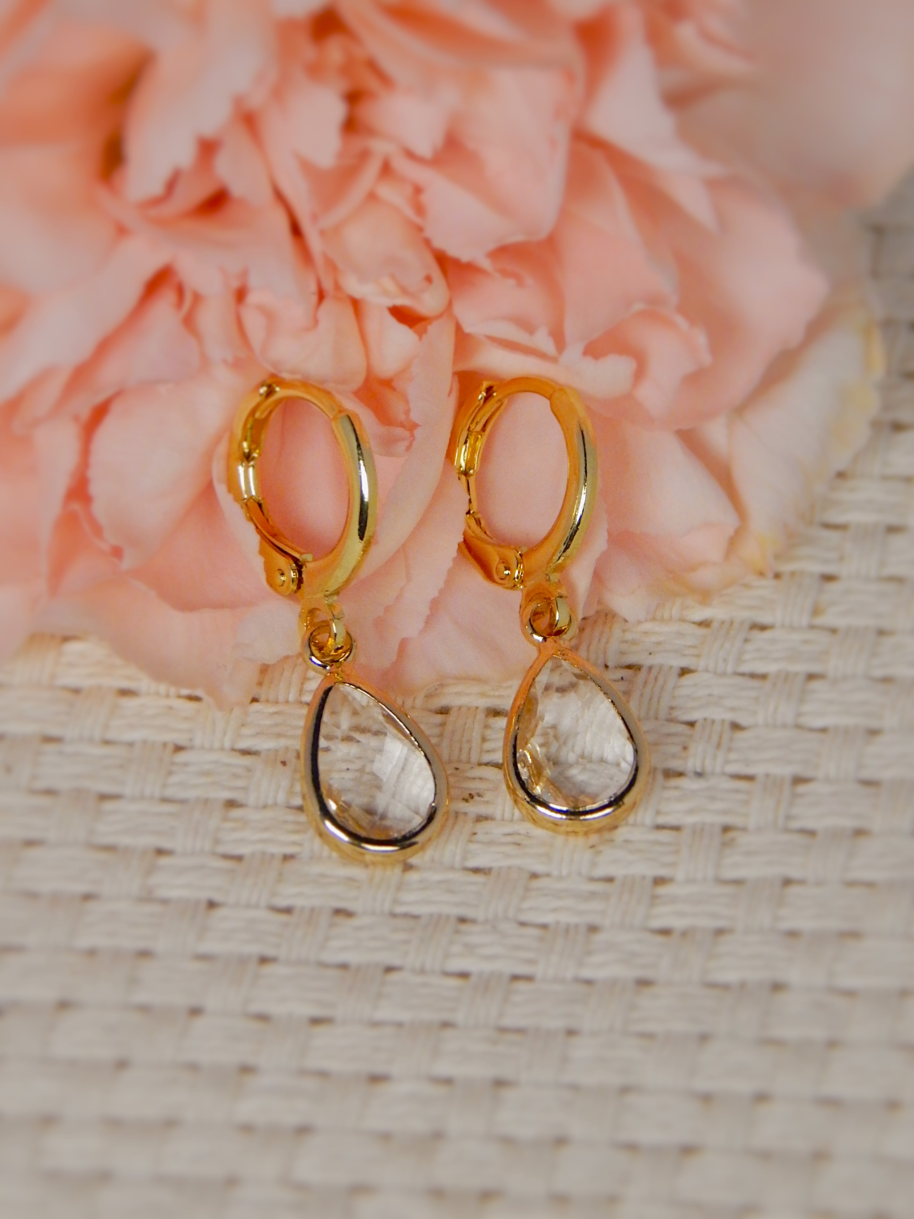 Gold huggie earrings with clear teardrop gemstone drop, simple everyday jewelry